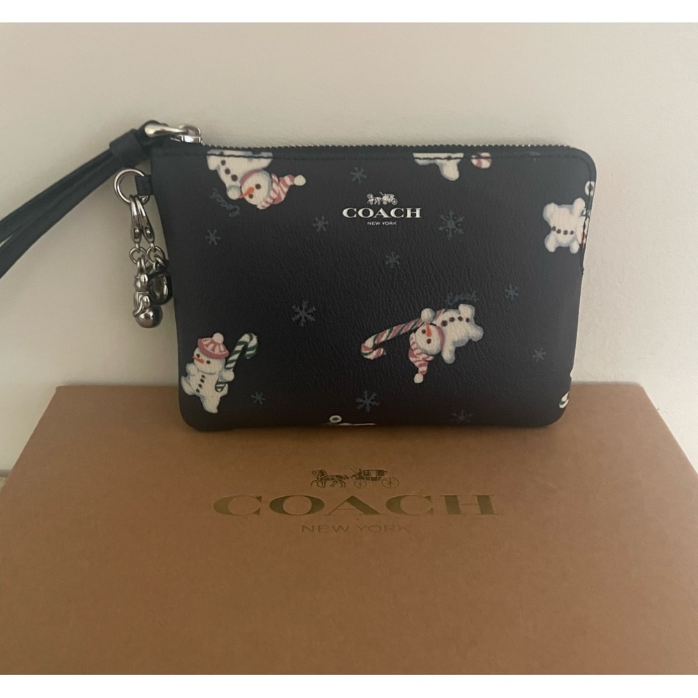 COACH Snowman Wristlet with Charms